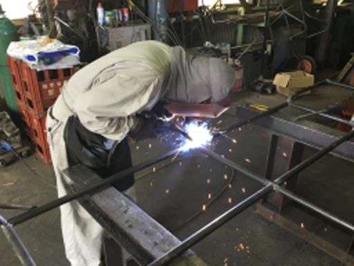 明成工業　有限会社